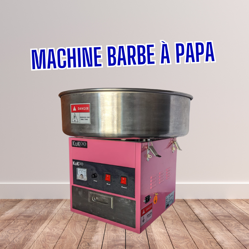 Machine barbe à papa (2) Machine barbe à papa rose, sur un fond de plancher