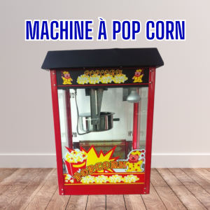 Machine à pop corn de face sur un fond de plancher avec écrit en gros "machine à pop corn"