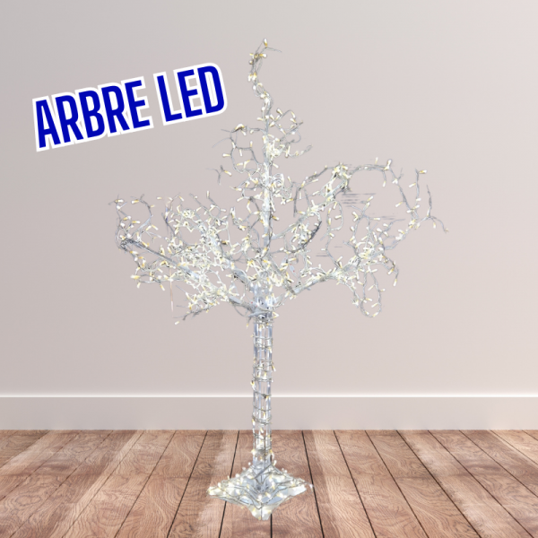 un arbre blanc factice avec des lumières led sur un fond de plancher et mur blanc
